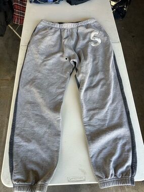 Supreme Gray Sweatpants with Dark Gray Side Panels & White 'S' Patch